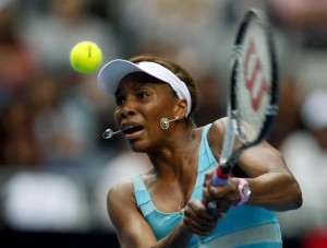 Williams of the U.S. hits a return to Sara Errani of Italy during their match at the Australian Open tennis tournament in Melbourne