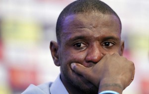 Barcelona's soccer player player Abidal gestures during news conference at Camp Nou stadium in Barcelona