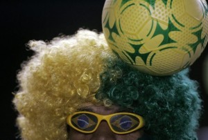 A Brazil fan waits for the start of the 2010 World Cup qualifying soccer match between Brazil and Ecuador in Maracana stadium in Rio de Janeiro