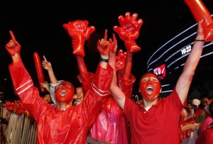 South Korean soccer fans celebrate their team's win after they watch a live TV broadcast of the 2010 World Cup Group B soccer match between South Korea and Greece in Port Elizabeth, in Seoul