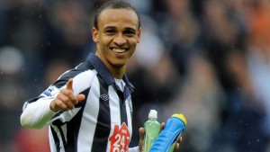 Peter Odemwingie of West Bromwich Albion celebrates victory at the end of the game