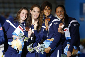 Bronze medalists France's Bonnet, Muffat, Balmy and Lazare at the women's 4x200m freestyle victory ceremony during the World Swimming Championships at the Sant Jordi arena in Barcelona