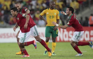 Morocco's Mehdi Namli celebrates his goal with team mates during their African Nations Cup Group A match against South Africa at the Moses Mabhida stadium in Durban