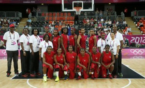 Members of Angola's national team pose before their women's Group A basketball match against Turkey at the London 2012 Olympic Games in the Basketball arena