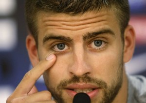 Barcelona's players Gerard Pique gestures during a news conference in Sant Joan Despi near Barcelona