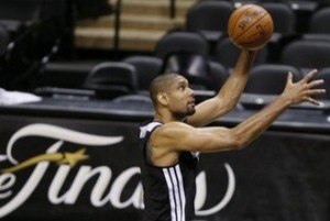 San Antonio Spurs Tim Duncan shoots during practice for their NBA Finals basketball playoff series against the Miami Heat in San Antonio