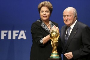 Brazil's President Rousseff poses with FIFA President Blatter after delivering a statement at the FIFA headquarters in Zurich