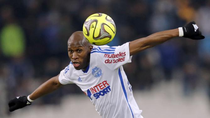 Olympique Marseille's Fanni heads the ball during their French Ligue 1 soccer match against Stade de Reims at the Velodrome stadium in Marseille