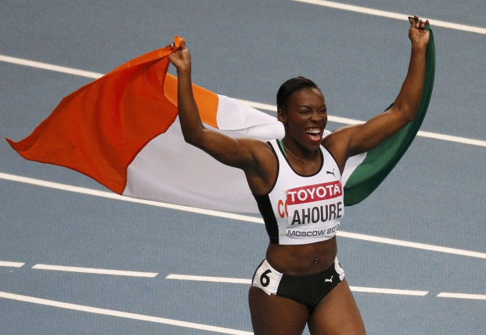 Murielle Ahoure of the Ivory Coast celebrates winning second place in the women's 100 metres final during the IAAF World Athletics Championships at the Luzhniki Stadium in Moscow August 12, 2013. REUTERS/Maxim Shemetov (RUSSIA - Tags: SPORT ATHLETICS)