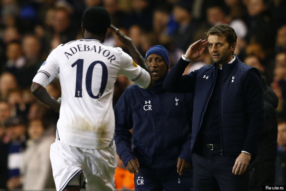 Tottenham Hotspur's Emmanuel Adebayor (L) celebrates with his manager Tim Sherwood (R) after scoring his side's third goal during their Europa League soccer match against Dnipro at White Hart Lane in London February 27, 2014. REUTERS/Eddie Keogh (BRITAIN - Tags: SPORT SOCCER TPX IMAGES OF THE DAY) - RTR3FSV2