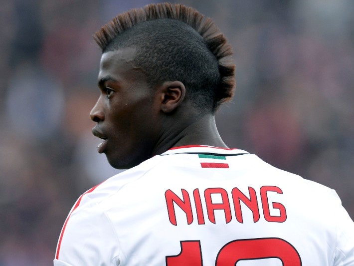 AC Milan's French forward M'Baye Niang reacts during the Serie A football match against Cagliari at the Cagliari's Is Arenas stadium on February 10, 2013. AFP PHOTO / ALBERTO LINGRIA