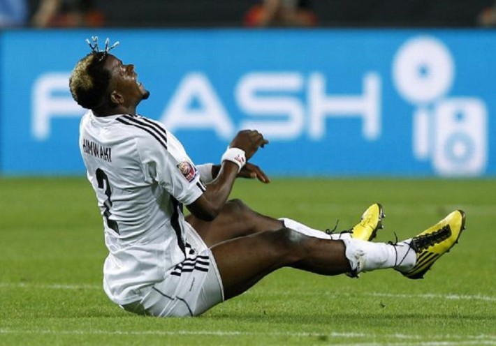 Joel Kimwaki of Congo's TP Mazembe celebrates after their Club World Cup semi-final soccer match against Brazil's Internacional at Mohammed Bin Zayed Stadium in Abu Dhabi December 14, 2010. REUTERS/Fahad Shadeed (UNITED ARAB EMIRATES - Tags: SPORT SOCCER)