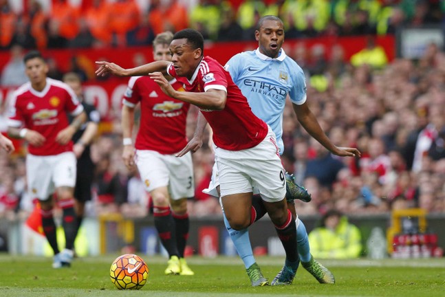 Manchester City's Fernandinho and Manchester United's Anthony Martial