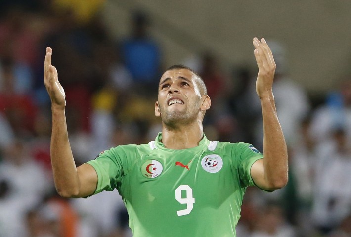 Algeria's Islam Slimani reacts after missing a goal during their African Nations Cup (AFCON 2013) Group D soccer match against Tunisia in Rustenburg, January 22, 2013. REUTERS/Mike Hutchings (SOUTH AFRICA - Tags: SPORT SOCCER)