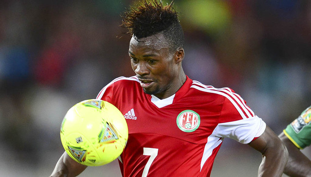 Fiston Razak Abdul of Burundi and Ibrassi Sy of Mauritania during the 2014 CAF African Nations Championships football match between Burundi and Mauritania at the Peter Mokaba Stadium in Polokwane, South Africa on January 18, 2014 ©Pic Barry Aldworth/BackpagePix