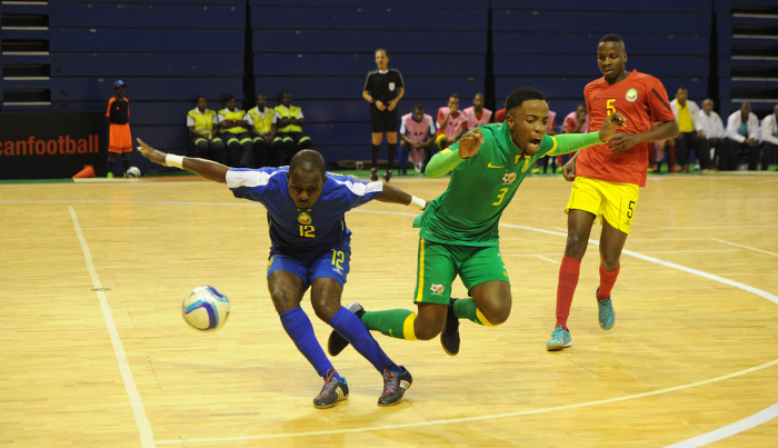 Josiah Tshabalala of South Africa is challenged by Nelson Joao Luvala of Mozambique during the Futsal African Cup of Nations match between South Africa and Mozambique on 15 April 2016 at Ellis Park Stadium Pic Sydney Mahlangu/ BackpagePix