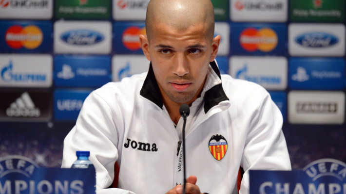 Valencia's Algerian midfielder Sofiane Feghouli gives a press conference at the Parc des Princes stadium in Paris, on the eve of an UEFA Champions League round of 16 second leg football match against Paris Saint-Germain (PSG). AFP PHOTO / FRANCK FIFE (Photo credit should read FRANCK FIFE/AFP/Getty Images)