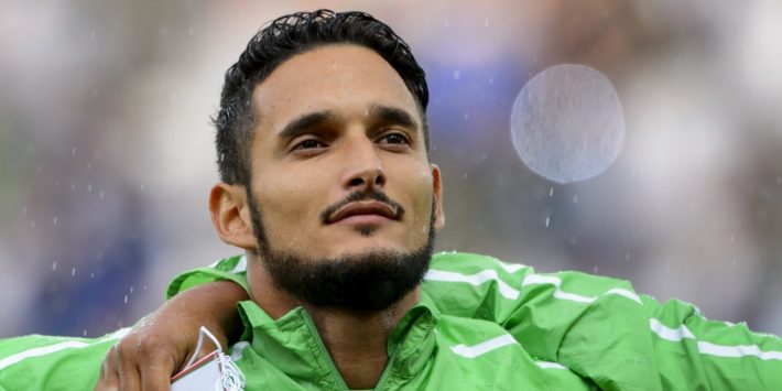 Algeria's defender Liassine Cadamuro listens the national anthem prior to a friendly football match between Algeria and Romania on June 4, 2014, in Geneva, ahead of the upcoming FIFA World Cup 2014 in Brazil. Algeria won 2-1. AFP PHOTO / FABRICE COFFRINI (Photo credit should read FABRICE COFFRINI/AFP/Getty Images)