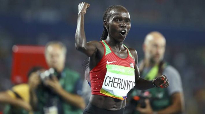 2016 Rio Olympics - Athletics - Final - Women's 5000m Final - Olympic Stadium - Rio de Janeiro, Brazil - 19/08/2016. Vivian Cheruiyot (KEN) of Kenya celebrates winning the gold. REUTERS/Lucy Nicholson FOR EDITORIAL USE ONLY. NOT FOR SALE FOR MARKETING OR ADVERTISING CAMPAIGNS.