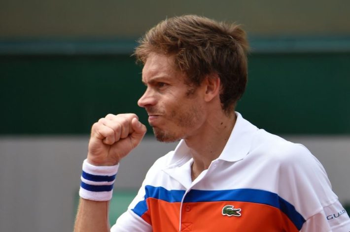 France's Nicolas Mahut reacts after winning a point against Ricardas Berankis during their men's first round match at the Roland Garros 2016 French Tennis Open in Paris on May 24, 2016. / AFP PHOTO / Eric FEFERBERG