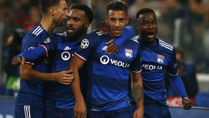Lyon's French midfielder Corentin Tolisso (2ndR) celebrates with teammates Lyon's French forward Alexandre Lacazette (2ndL) and Lyon's French forward Maxwel Cornet (R) after scoring during the UEFA Champions League football match Juventus vs Olympique Lyonnais on November 2, 2016 at the Juventus stadium in Turin. / AFP / MARCO BERTORELLO (Photo credit should read MARCO BERTORELLO/AFP/Getty Images)
